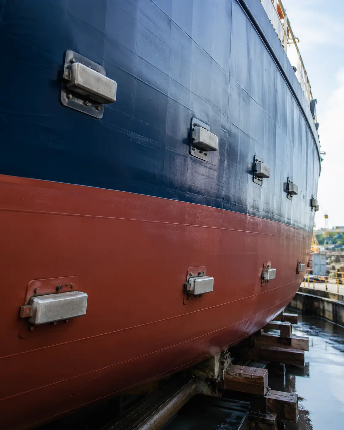 Engineer reviewing hull anode drawing
