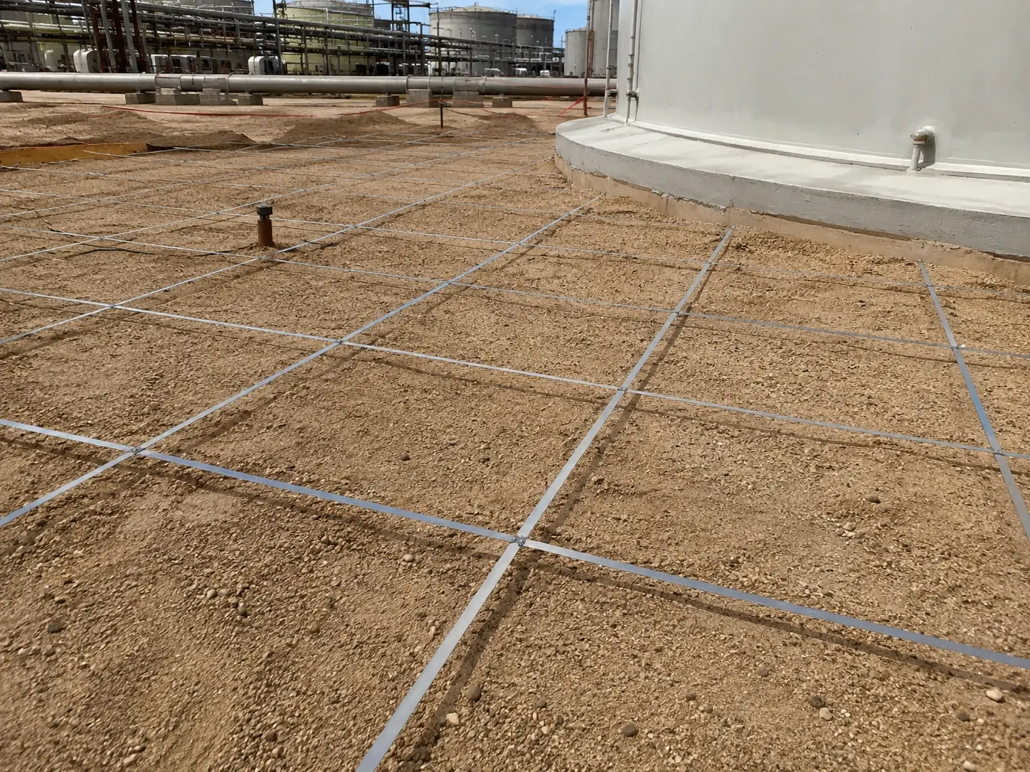 Engineer reviewing MMO ribbon anode