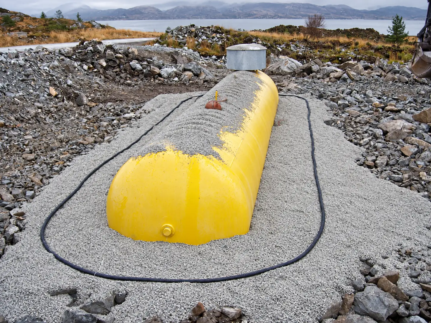 Engineer reviewing pipeline cathodic protection drawings